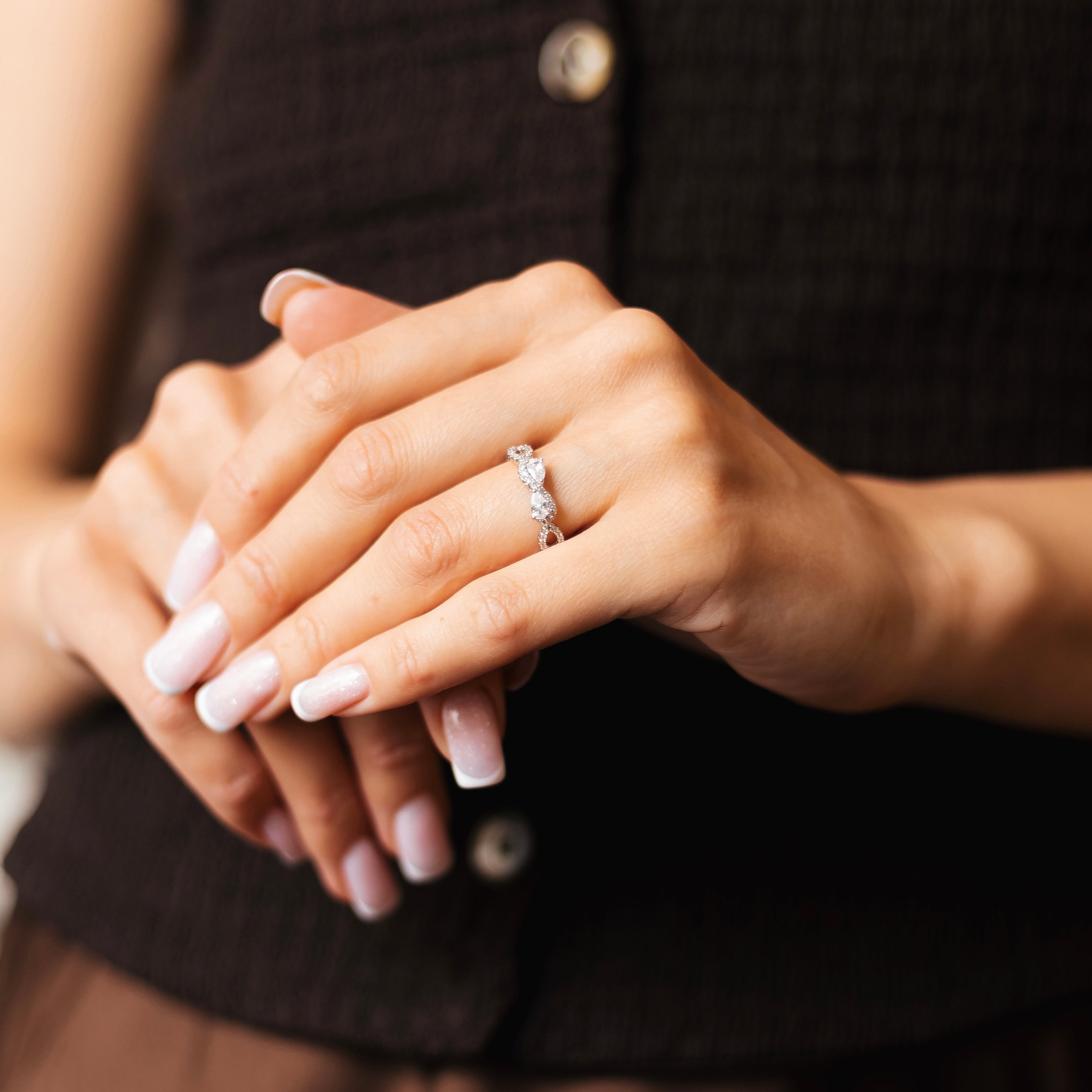 Rhodium Plated Infinity Ring with CZ – Adjustable Size 7–8